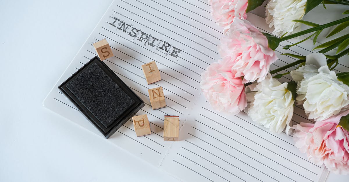 Stamps of passport gone - Black Notebook on White Table