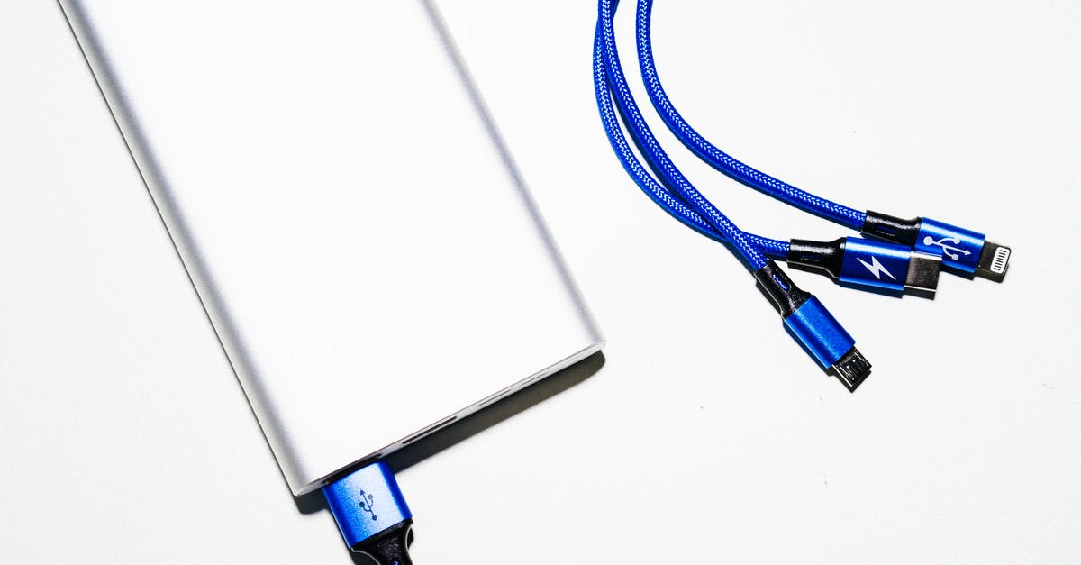 Stansted Airport USB Charging Outlets - White Power Bank and Blue Coated Wires