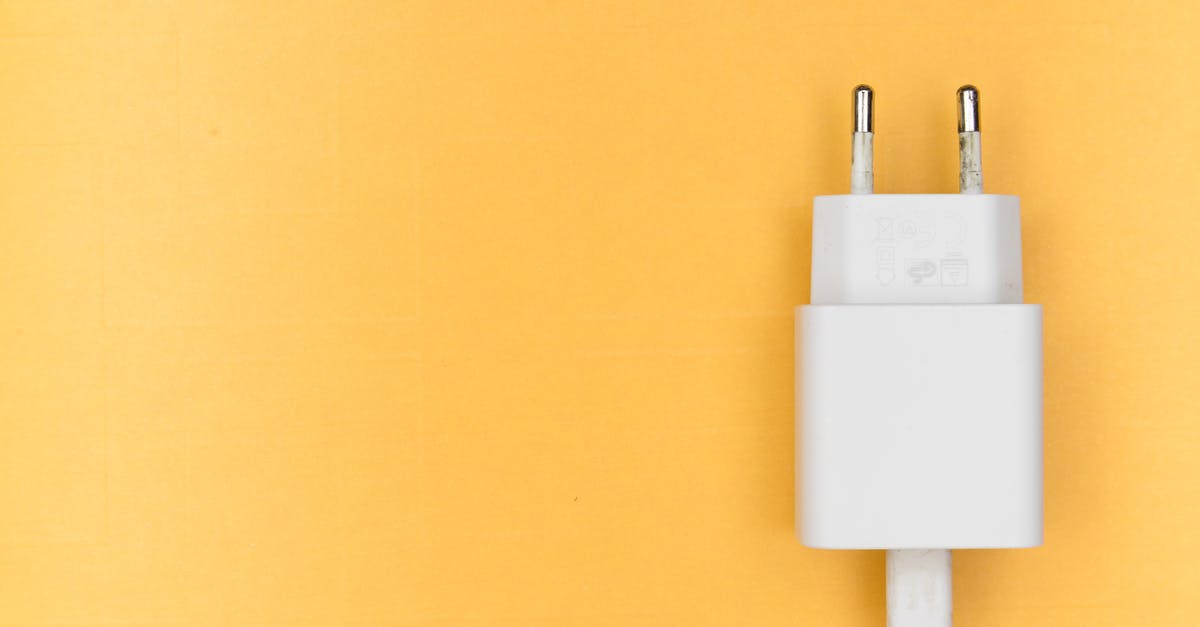 Stansted Airport USB Charging Outlets - Mobile Adapter on Yellow Surface