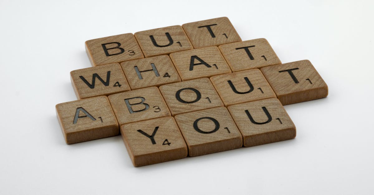 STATI Schengen : What does it mean - Brown Wooden Blocks on White Table