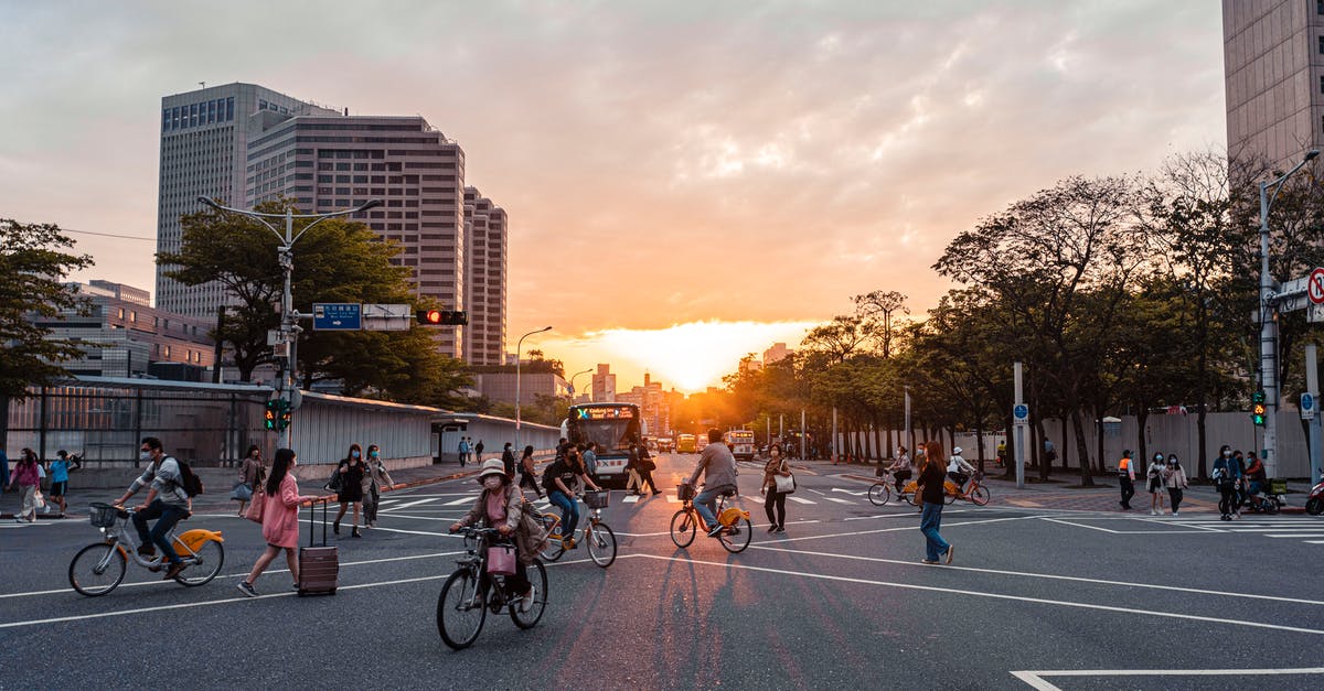 Staying in Taiwan - People Riding Bicycles on Road