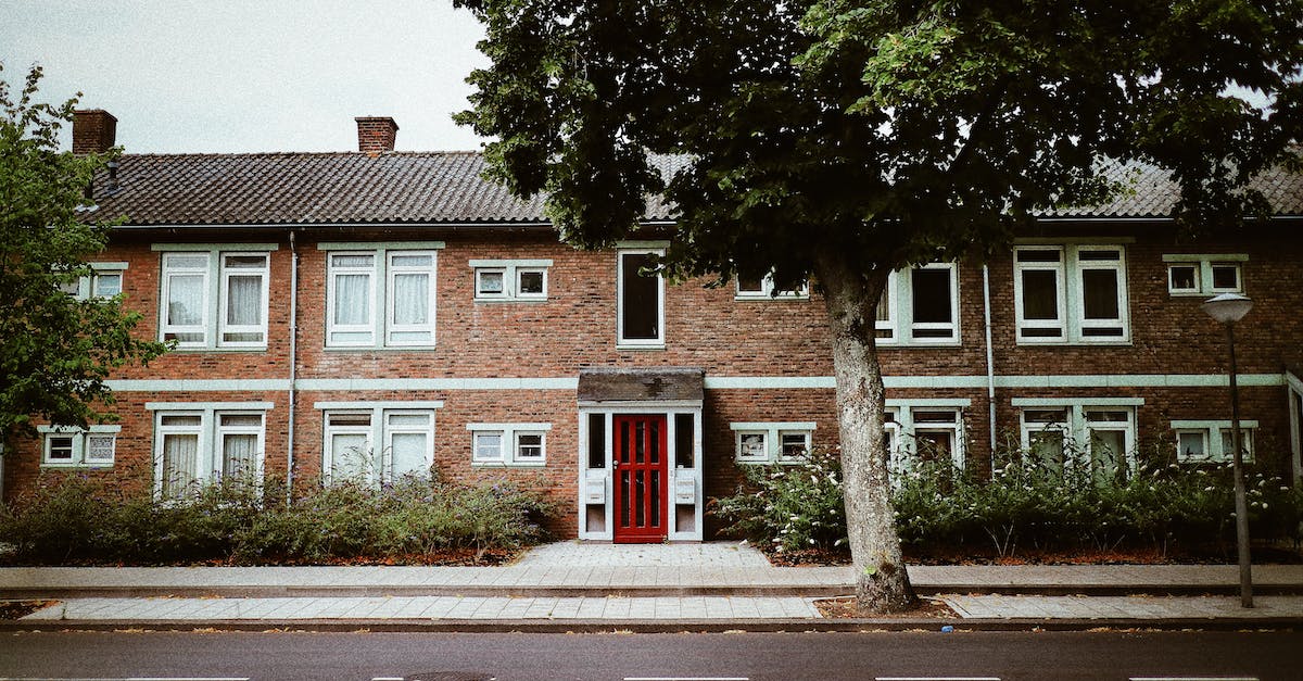 Steak house in Amsterdam? - Frontage Of A Concrete Building With Brickwall