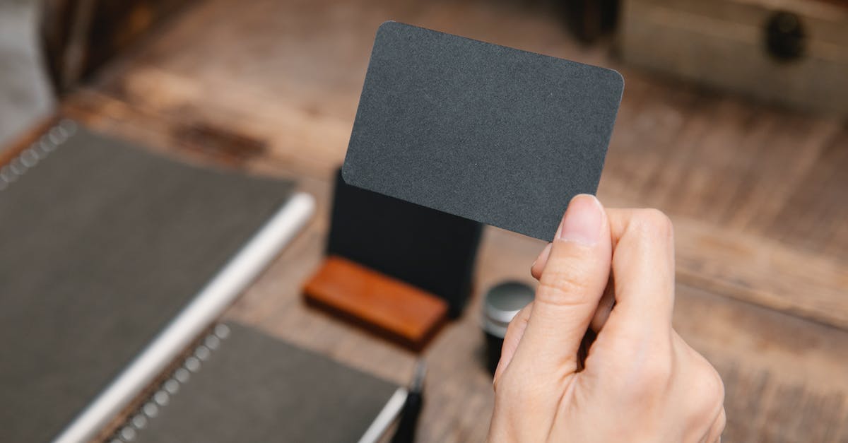 Stockholm: to Arlanda on an SL card - Close Up Photo of Person Holding a Black Card