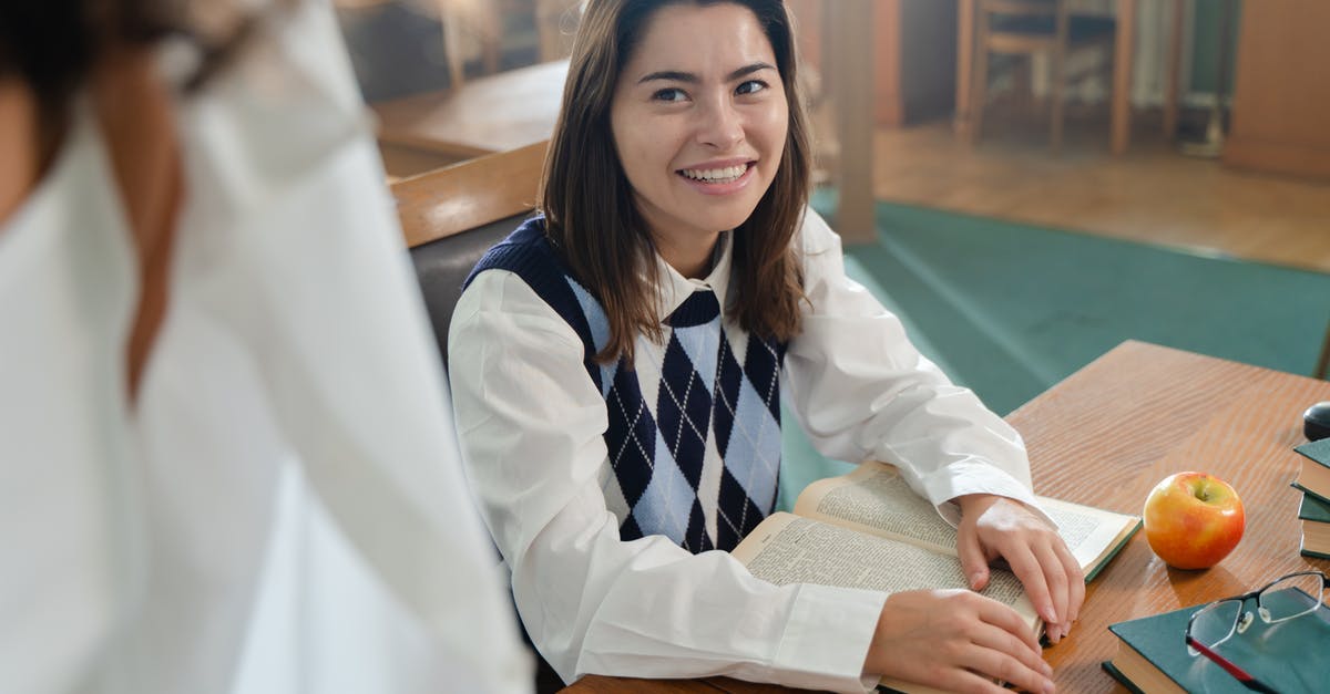 Student Resident permit [duplicate] - Woman in White Blazer Sitting on Chair