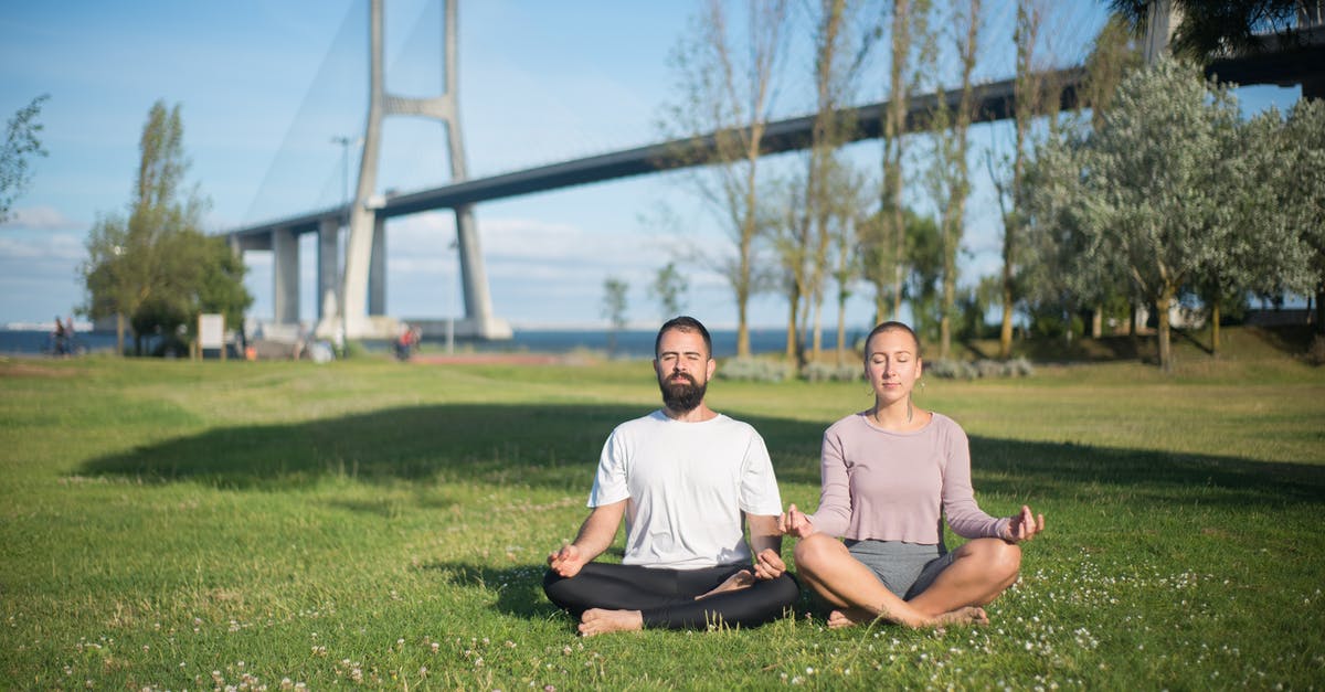 Suggestions for Outdoor Activities in Cambridge? [closed] - Man and Woman Meditating at the Park