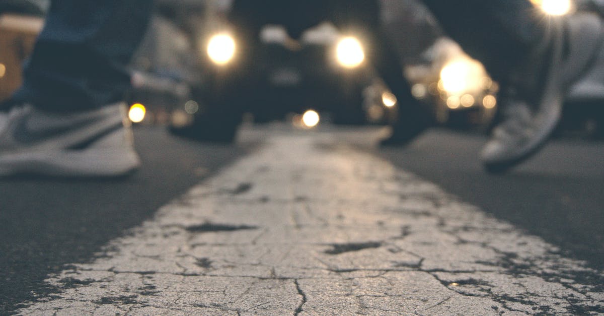 Suitable shoes for long-term, light-packing travel [closed] - People Crossing on Street