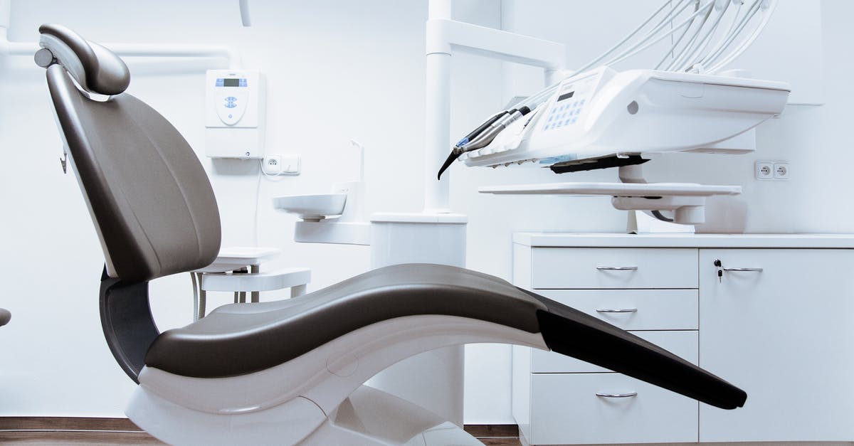 Sweets as gifts in lands untouched by modern dentistry - Black and White Dentist Chair and Equipment