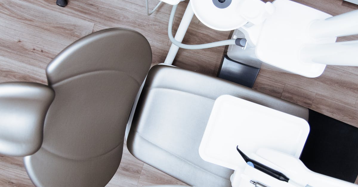 Sweets as gifts in lands untouched by modern dentistry - Chairs Arranged on Table