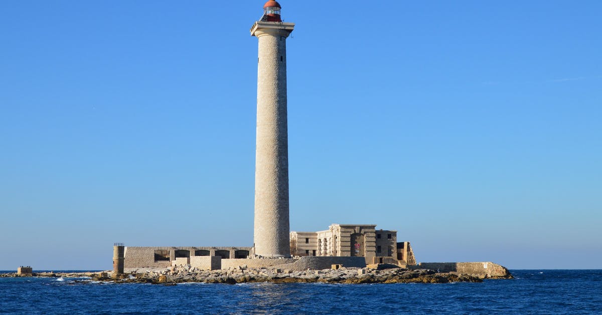 Sworn statement traveling to France - Gray Concrete Lighthouse Under the Blue Sky