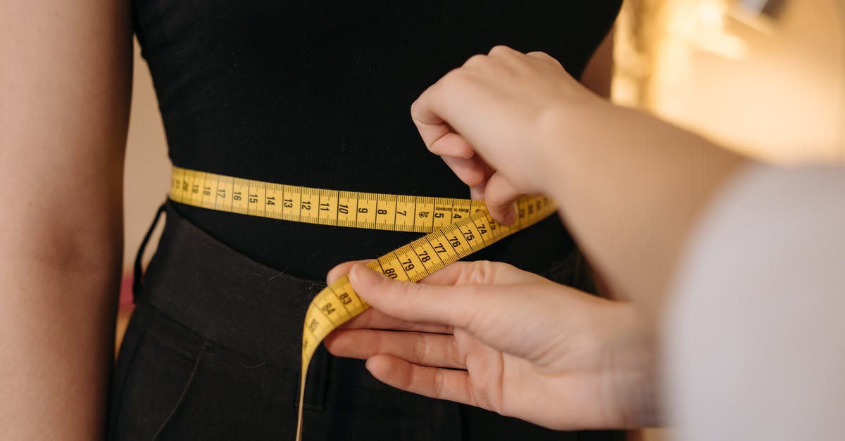 Tailor in Hurghada, Egypt [closed] - A Person Using a Measuring Tape