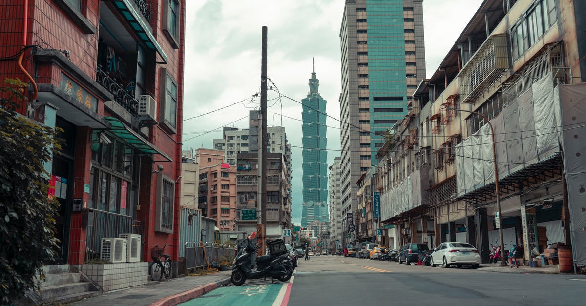 Taiwan maximum stay -- on landing or passing immigration? - Cars on Road Between High Rise Buildings