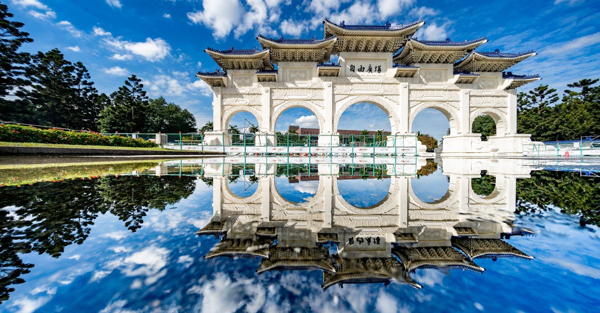 Taiwan proof of funds for Filipino visa exempt tourist - White oriental memorial archway in sunny day