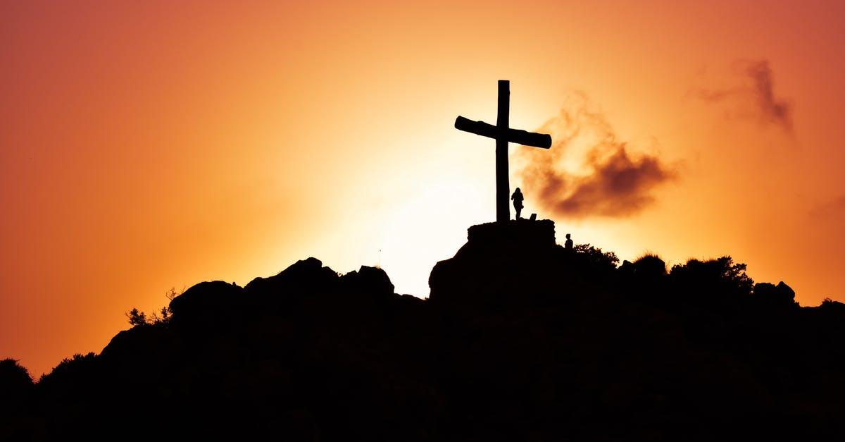 Taizé prayer in Bucharest: where? - Human Standing Beside Crucifix Statue on Mountain