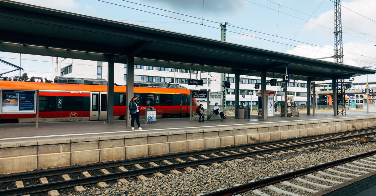 taxis in Rust, Germany - Red and White Train on Rail