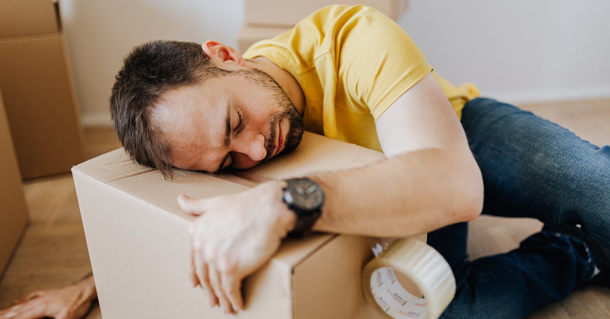 Temporary lock for rented accommodation [closed] - Tired man fell asleep on carton box