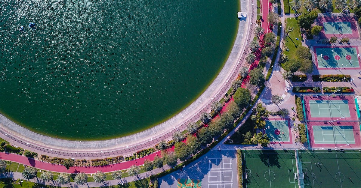 Tennis courts inside or near Kruger National Park - Aerial View of Large Body of Water