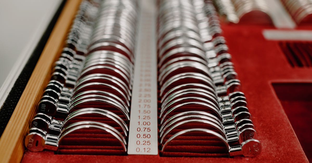 Testing Kit to Transit Heathrow to Belfast? - From above of arranged rows of trial spectacle lenses for examining visual impairments in clinic