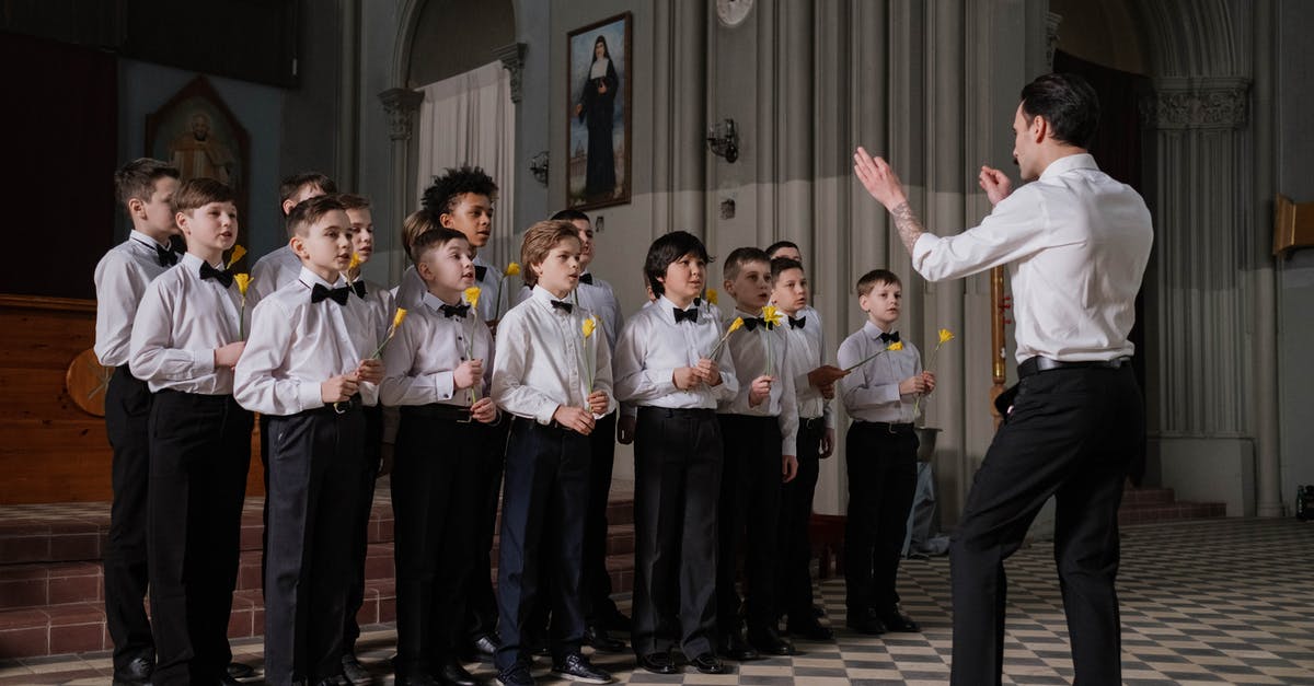 The boys of the NYPD choir, singing Galway Bay? - A Choir Singing While Holding a Flower