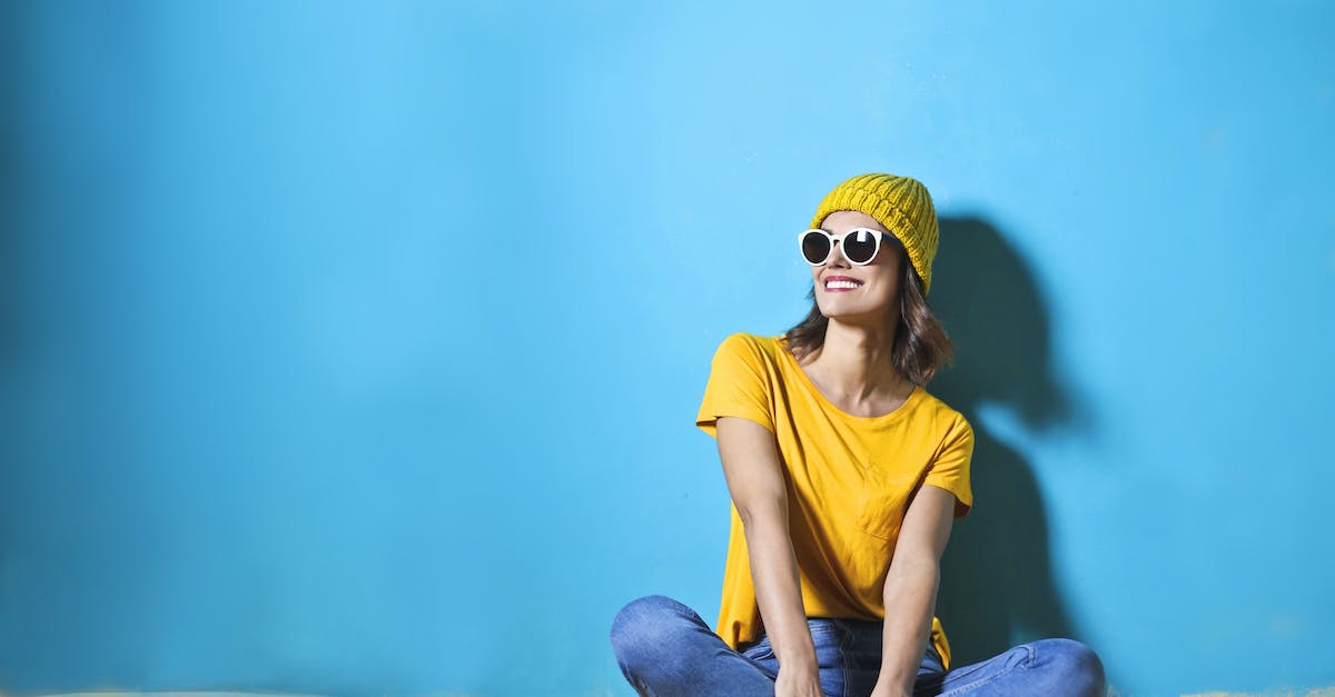 The Great Wall of China: Where should I start a visit? - Woman in Yellow Shirt  Sitting on Brown Wooden Floor