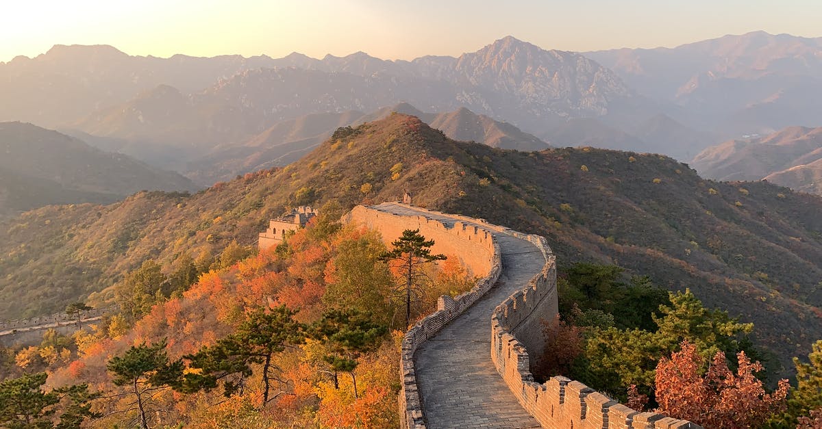 The Great Wall of China: Where should I start a visit? - Ancient fortress on green hill