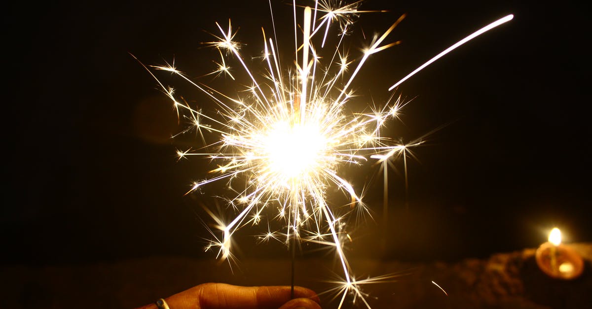 There's any party on Seine? [closed] - Person Holding Firework