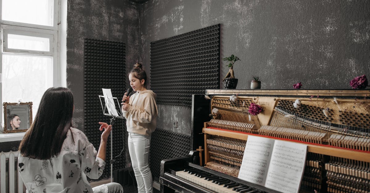 Throat singing lessons in Mongolia - A Girl Reading a Sheet Music while Singing