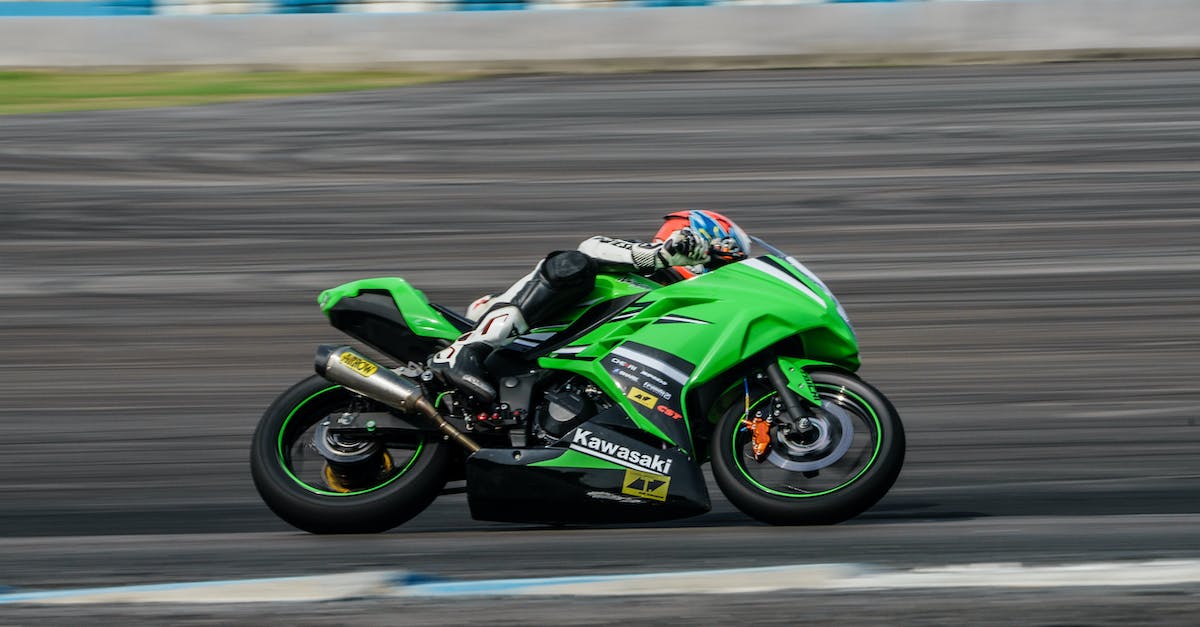 Tickets for the Italian F1 Grand Prix at Monza [closed] - Man Riding on Green Sports Bike