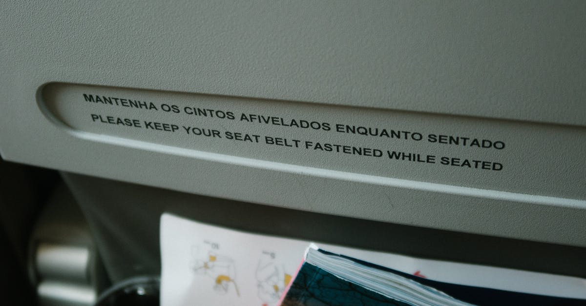 Timatic and Refugee Travel Document - Close-up Of Aviation Policy On The Back Of An Airplane Seat