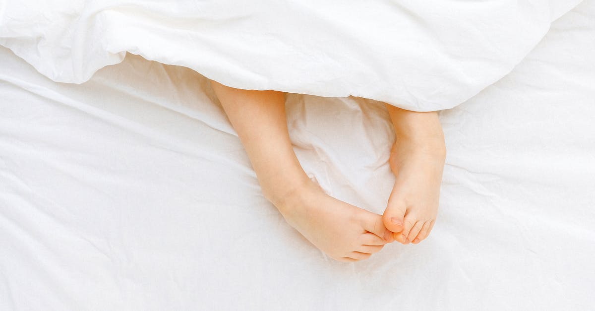 Time needed to board Sandefjord-Stromstad ferry on foot - Person Lying On White Bed