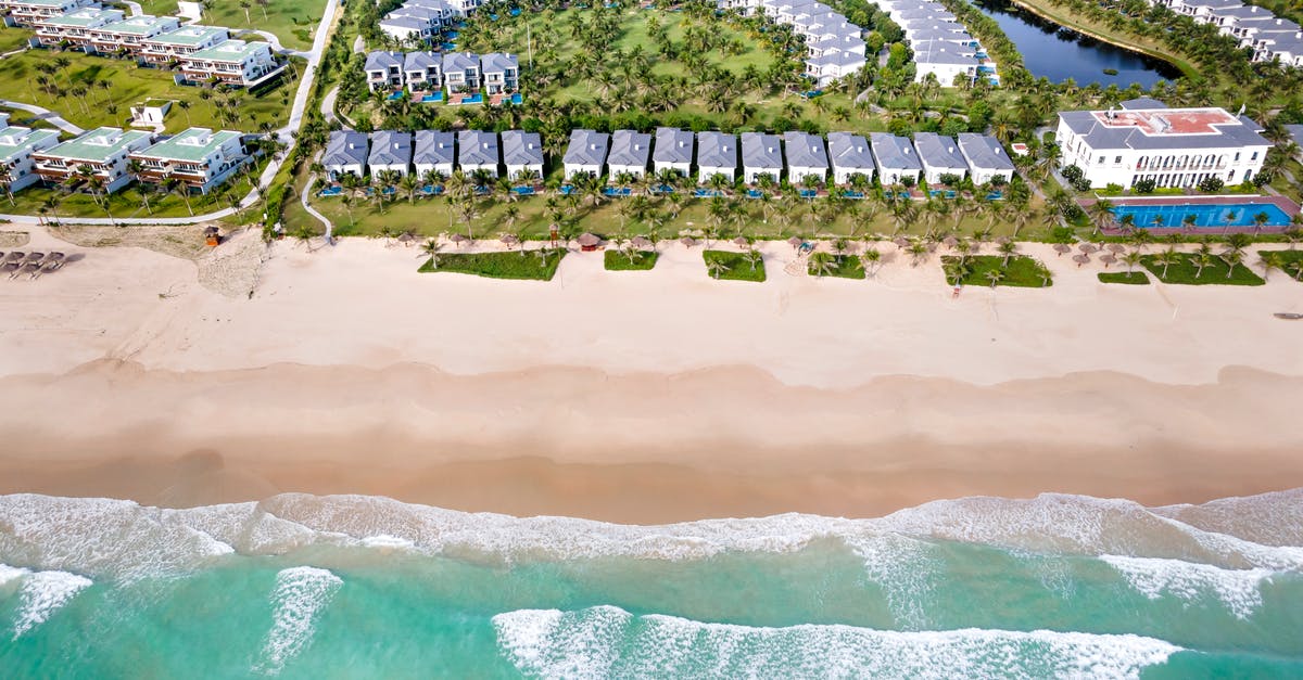 Tipping at all inclusive resort - Aerial View of Buildings Near the Shore