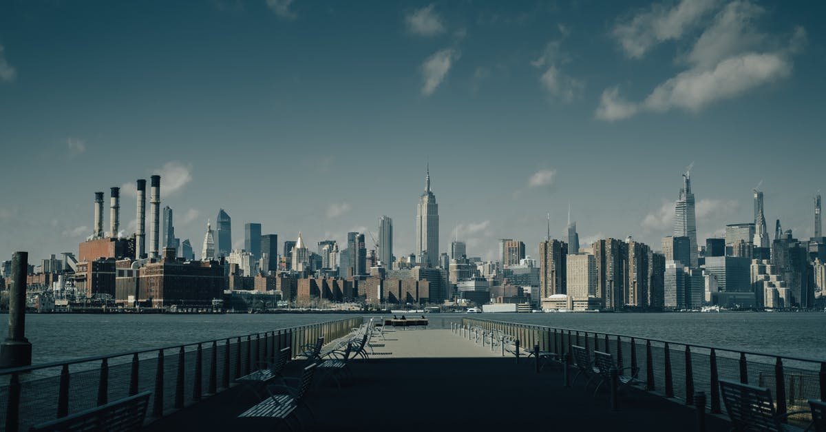 Tipping in NYC restaurants - City Skyline Under Blue Sky