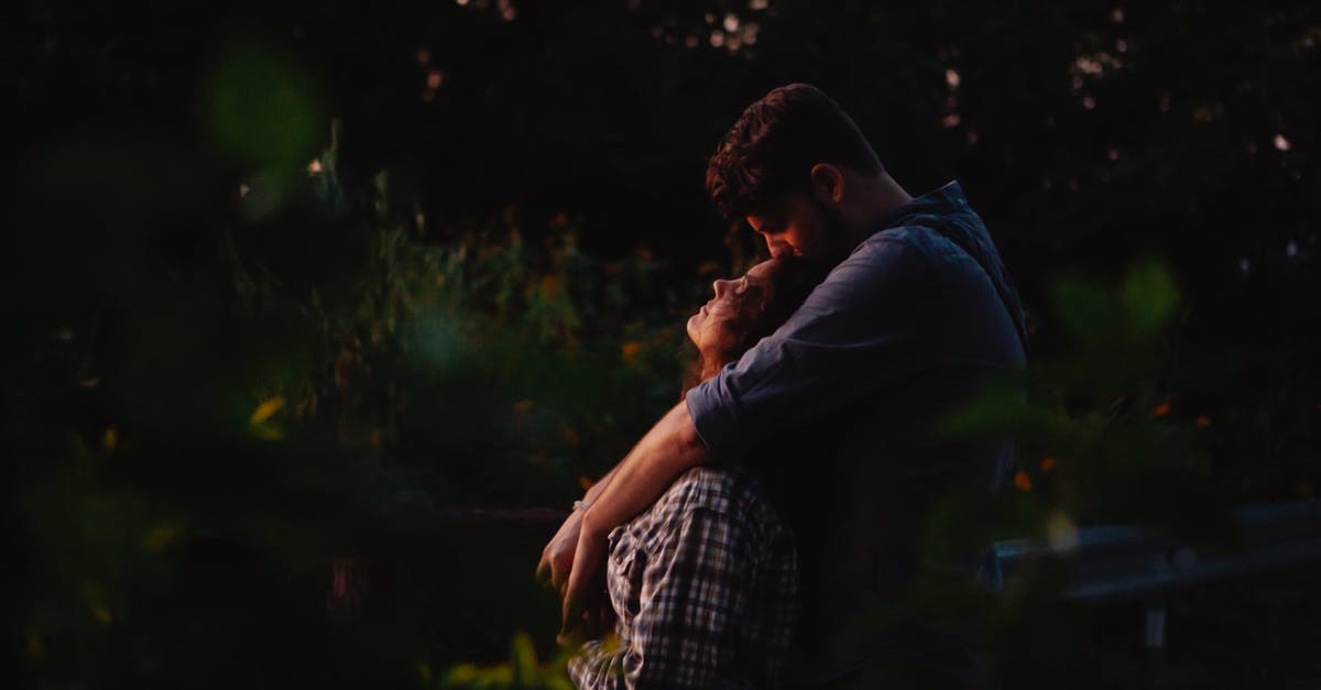 Tourist Schengen visa dates do not match itinerary - Loving young couple embracing in forest at sunset