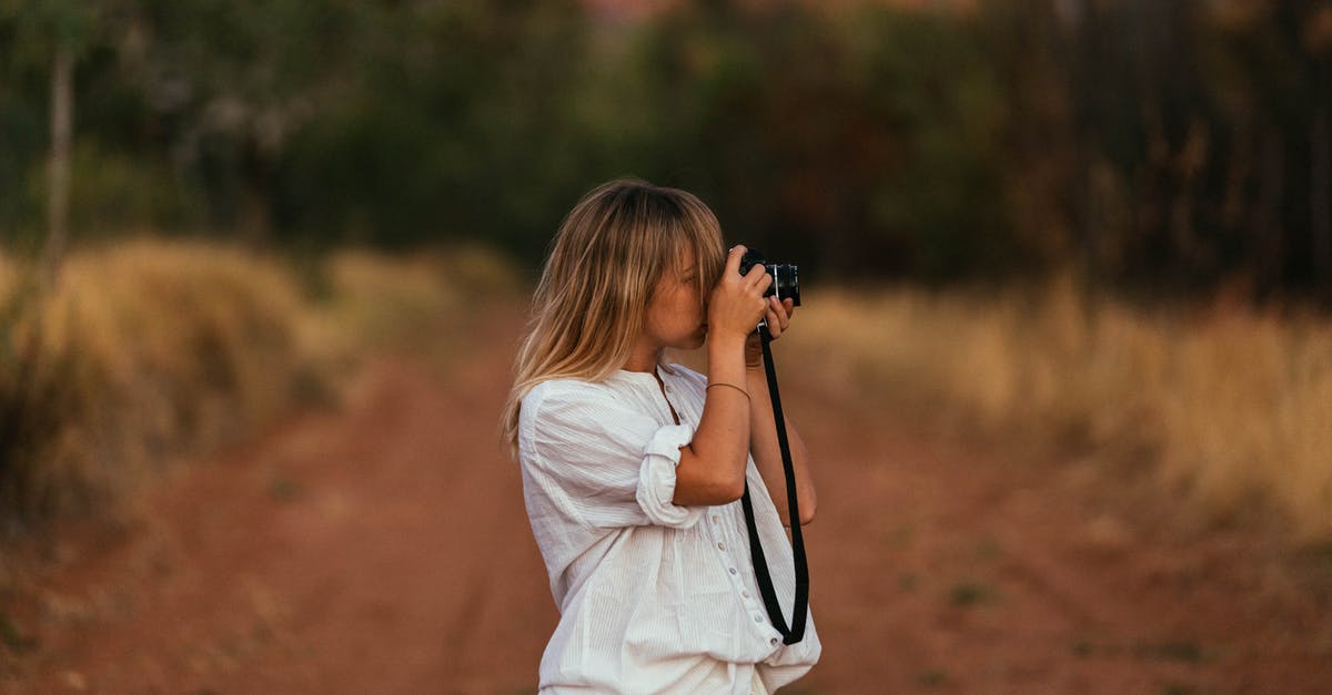 Tourist Visa B1/B2 [duplicate] - Female Tourist Taking Photos Outdoors