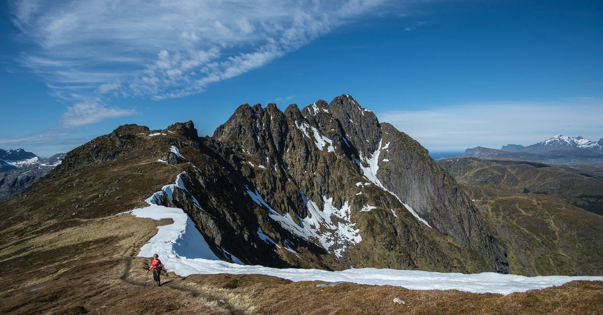 Tourist visa from Norway [closed] - Woman Holding A Trekking Pole At mountain Peak