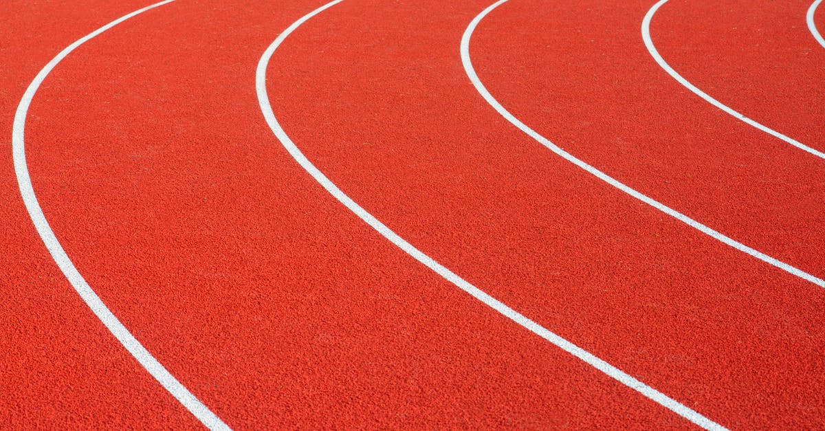 Track & field standard (400 meters) stadiums recommendations in Haifa? [closed] - Close-up of Red and White Track Field