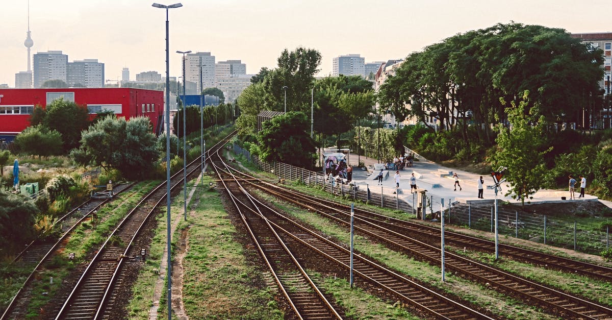 Traffic Ticket in Germany [duplicate] - Railways Beside Red Building