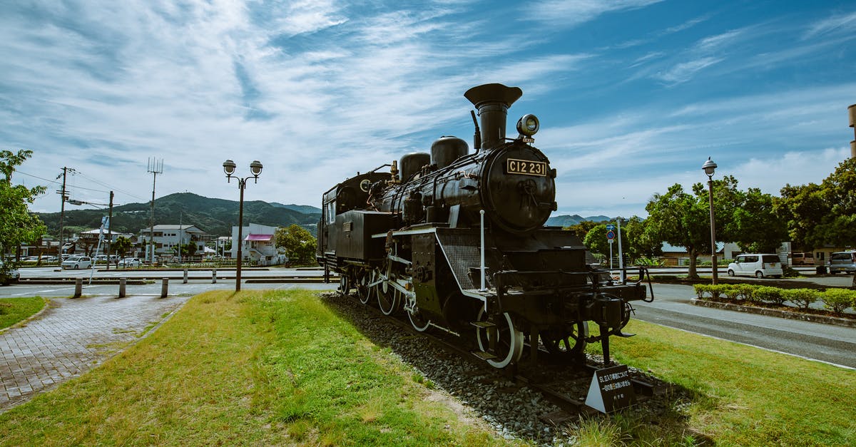 Train Chepe Chihuahua Regional in December - Black Train on Rail Under Blue Sky