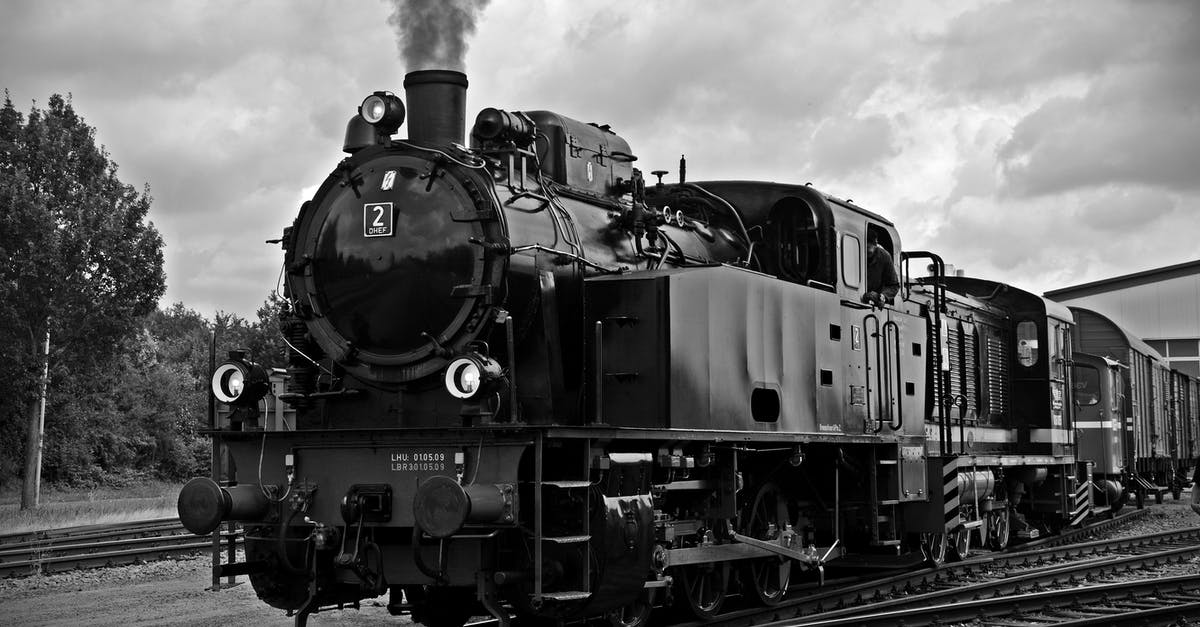 Trains dividing: which carriage goes where? - Train on Railroad Tracks Against Sky