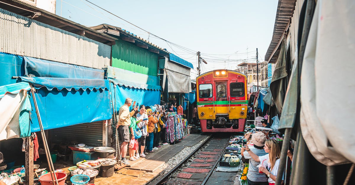 Trains in and out of Bangkok around Songkran - People Walking on the Street