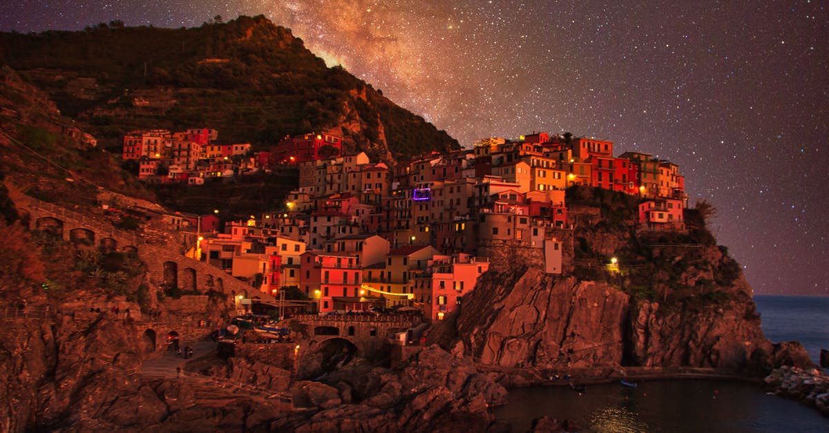 Trains in the Cinque Terre - The Colorful Cinque Terre Village in Manarola Italy at Night