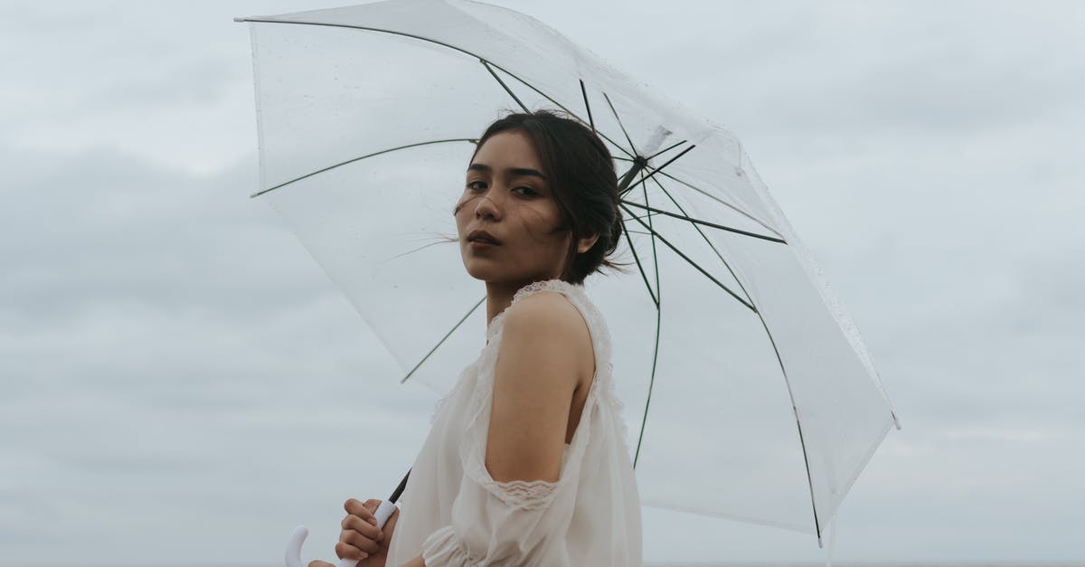 Transatlantic cruises allowing casual dressing? - Photo Of Woman Holding Umbrella