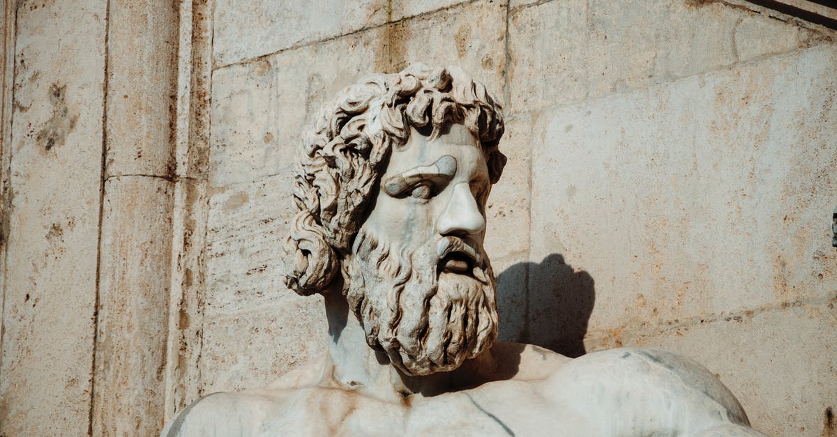 Transiting Albania to Italy [closed] - Close-Up Photo of a Statue