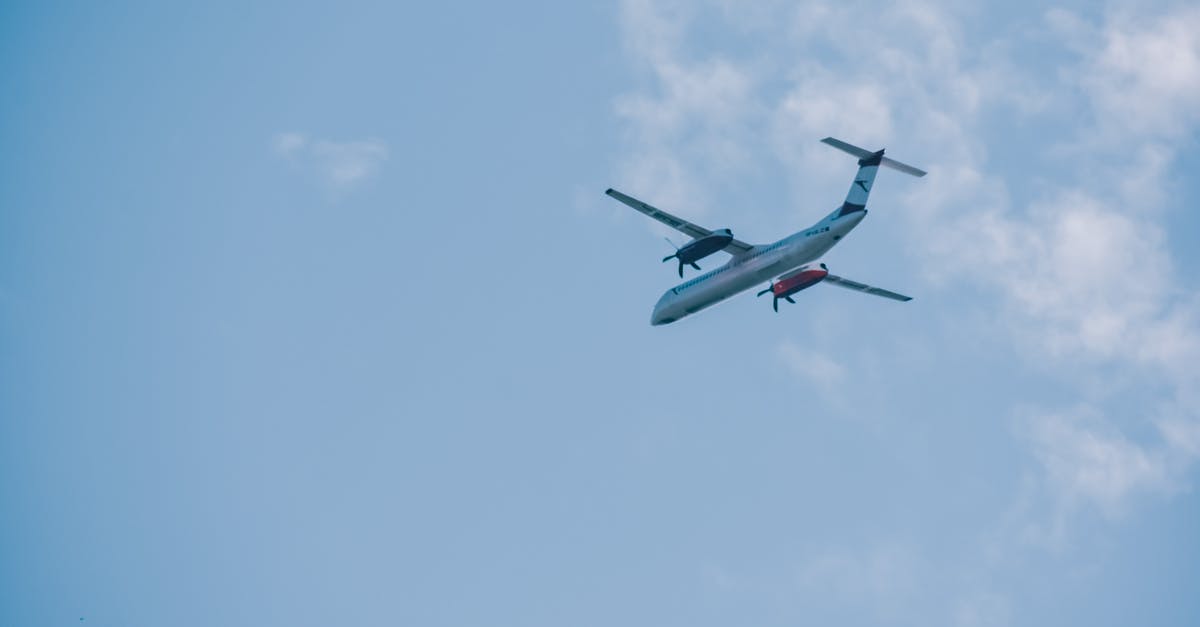 Transiting through Montreal on flight from France to Chicago - Airplane flying in blue sky