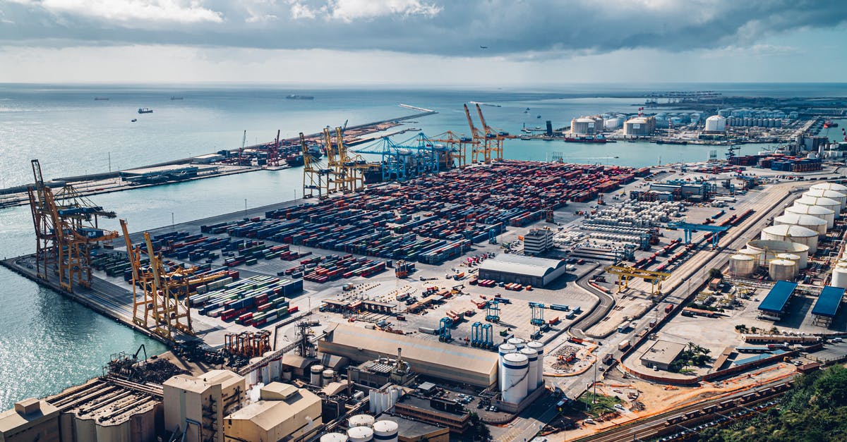 Transiting through Panama to Port of Spain - Shipping Pier Near Body of Water