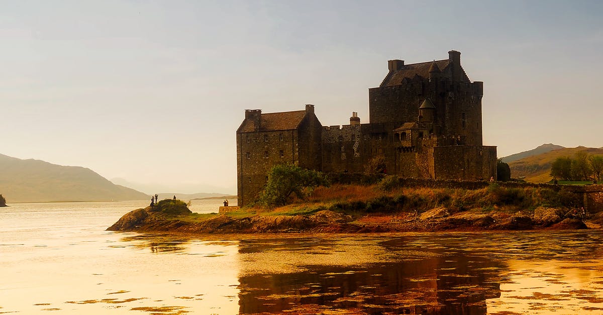 Transiting through Scotland from a quarantined country - Bricked Building Near Body of Water