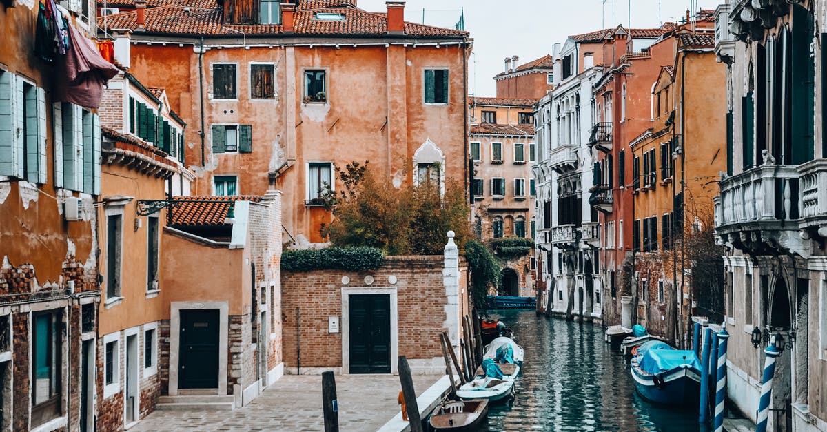 Transiting via Madrid to Venice - Street with Gondolas in City on Water