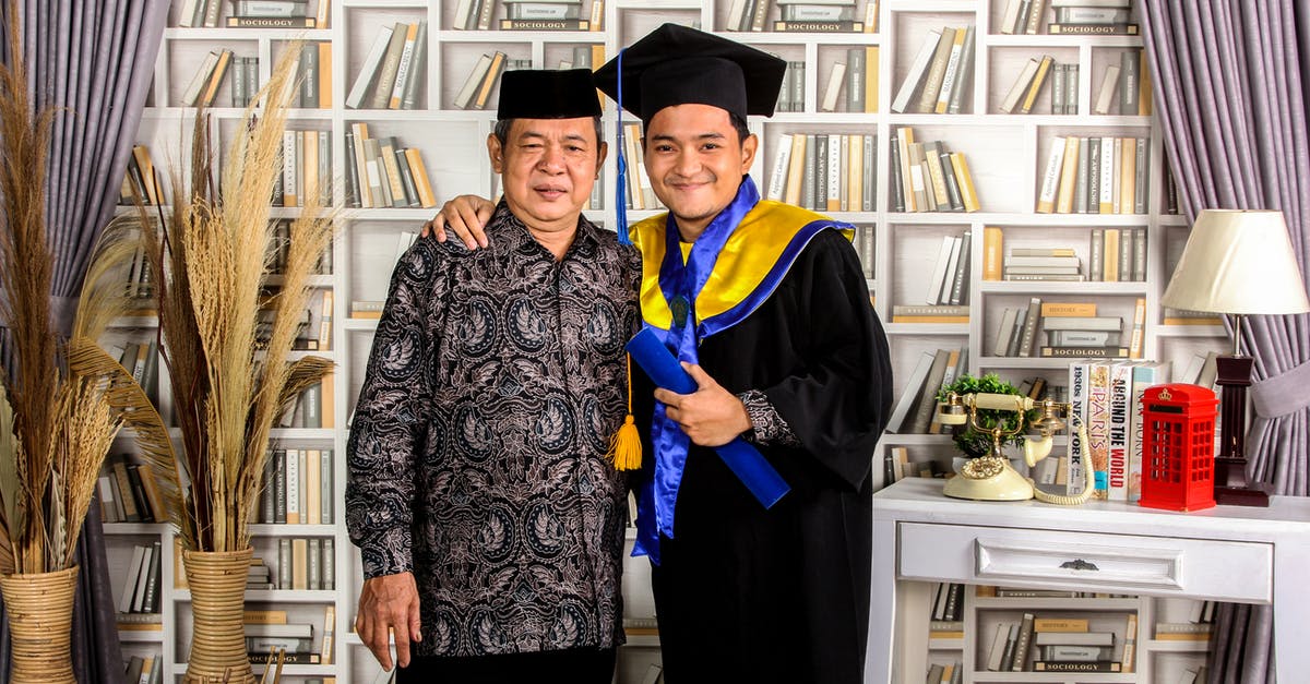 Translating a translated birth certificate - Woman in Black Academic Dress Standing Beside White Wooden Shelf