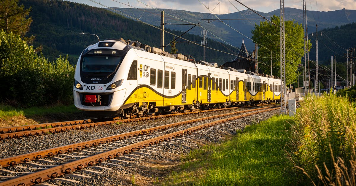 Trans-Siberian railway to Tajikistan - White and Yellow Train on the Railway