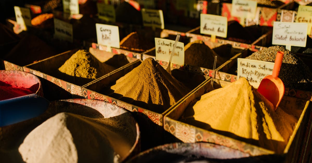 Travel to Altiplano (Bolivia) from Villazon without a local tour? - Traditional market stall with various aromatic spices