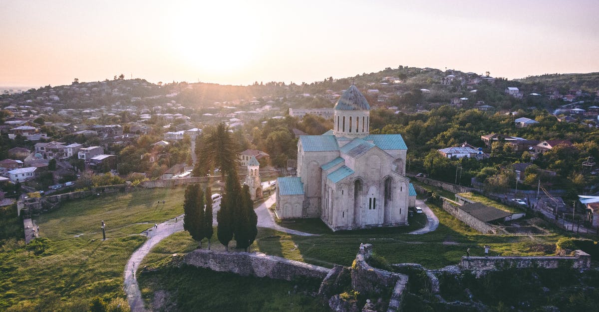 Travel to Georgia with EU ID Card? - An Old Building In The Middle Of A Grassland